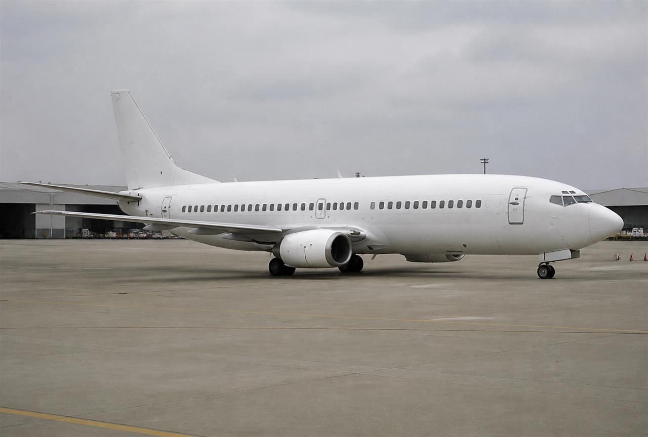 Representative image of an unmarked Boeing 737 Classic narrowbody aircraft on an apron